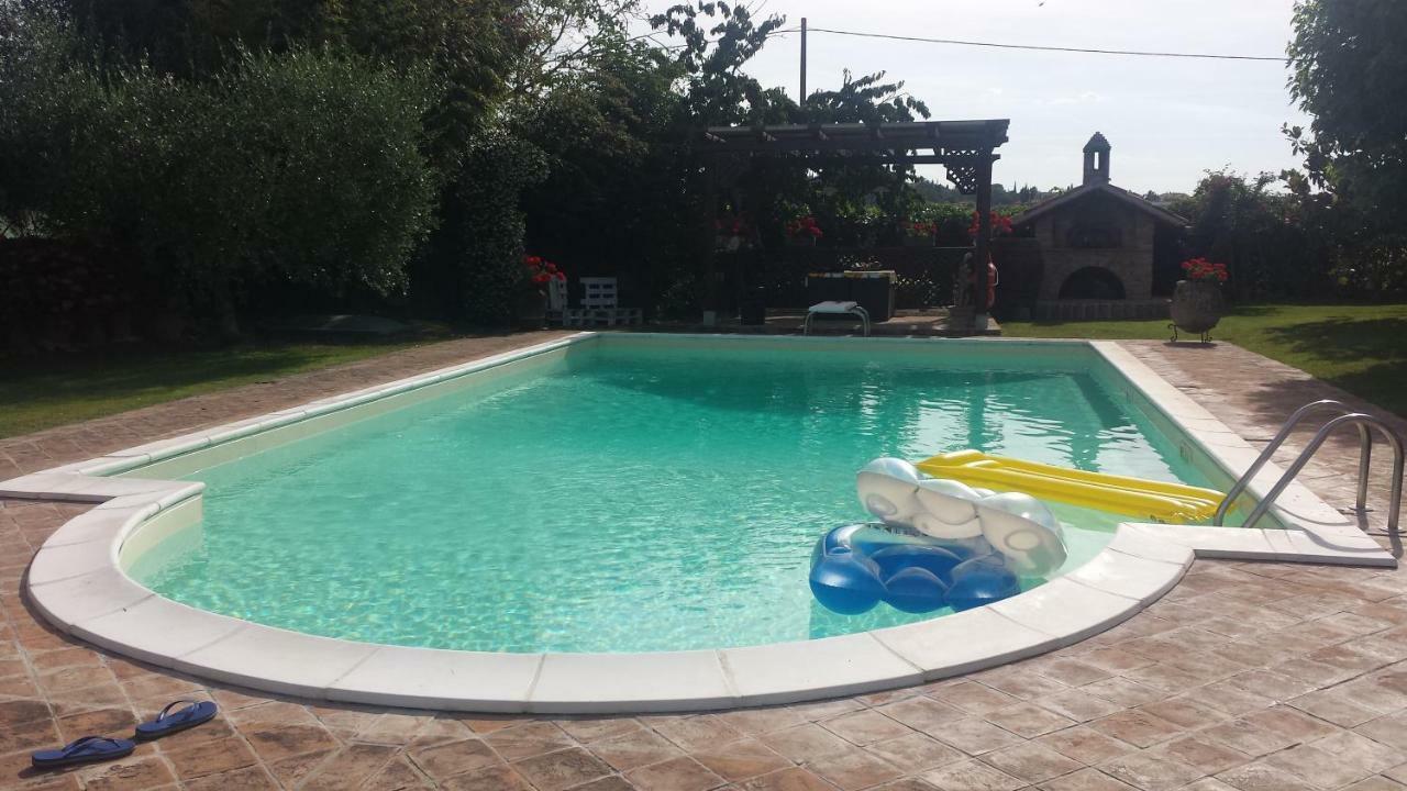 Casa La Quiete Villa Torgiano Bagian luar foto